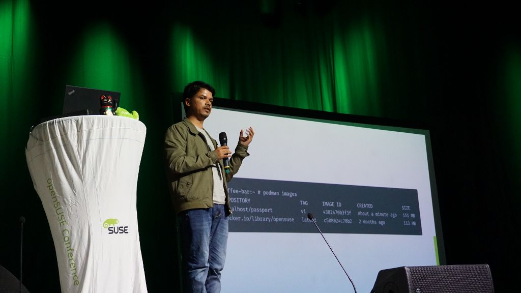 Me, presenting how we use openSUSE MicroOS at La Sentinelle. Photo courtesy, Saputro Aryulianto.