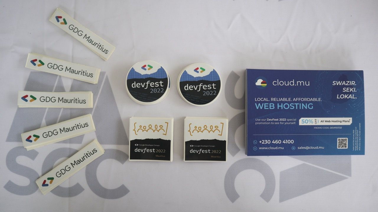 DevFest stickers and cloud.mu discount voucher